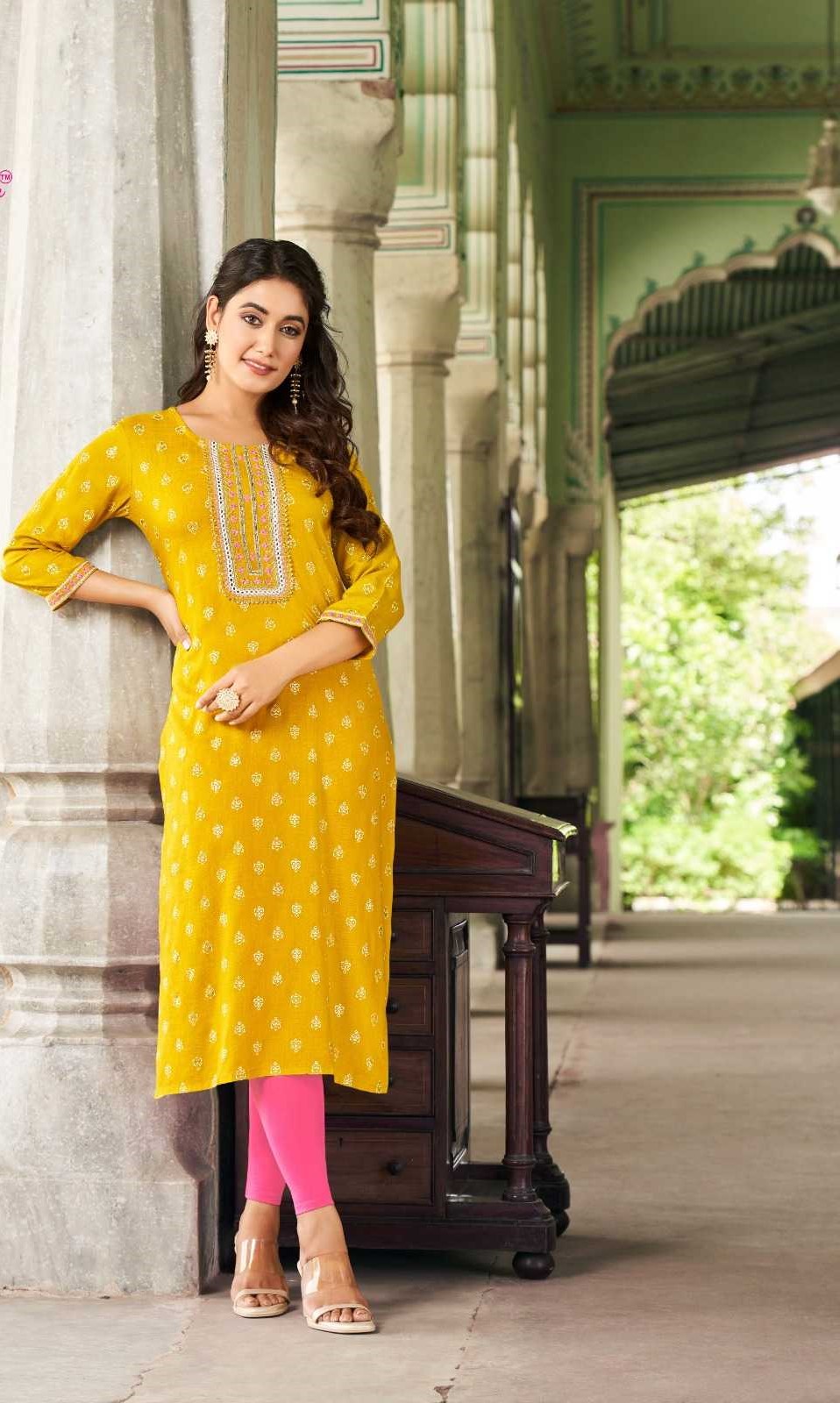Yellow Heavy Rayon Embroidery Casual Wear Kurtis 8001
